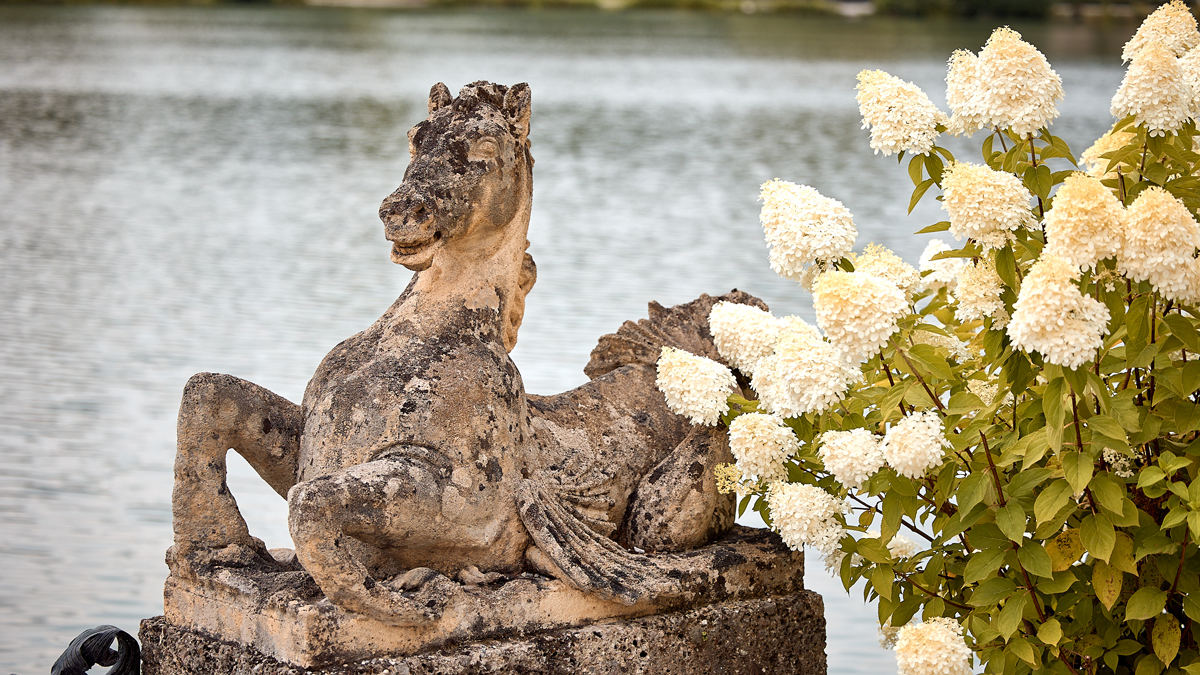 This is a photo of one of the seahorse statues that guards the lakeside entrance of Schloss Leopoldskron.