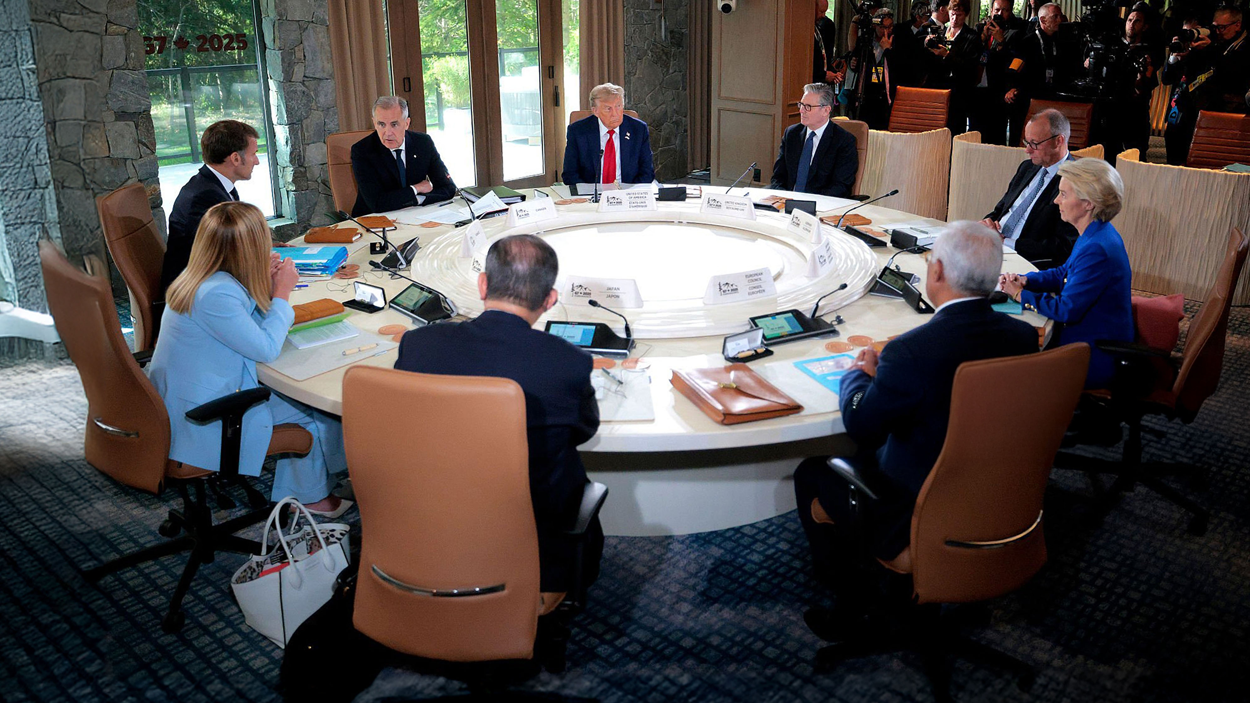 World leaders sit around a circular table during a discussion at the G7 Summit on June 16, 2025